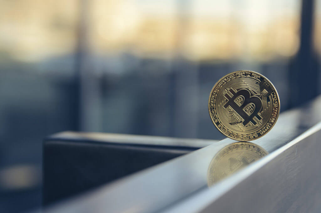 Bitcoin Brushes Against $10,000 Before Sinking Back