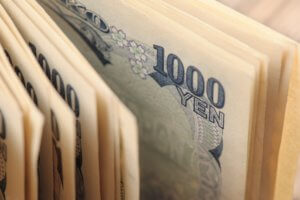 The Japanese yen hit a record low Wednesday. Why's that? 